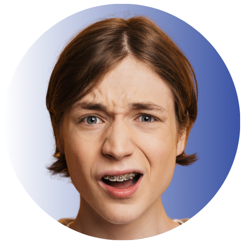 teen boy with loose broken dental bracket