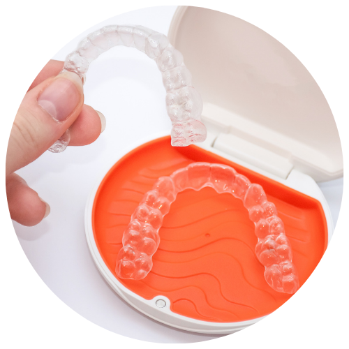 essix retainers in case for tooth retention after orthodontic treatment