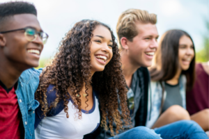 group of smiling teenagers who all needs braces